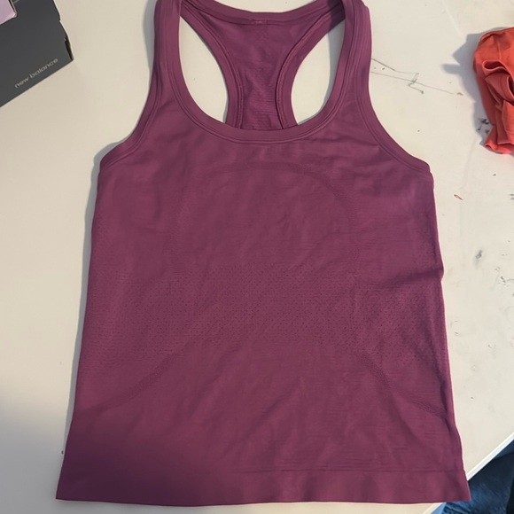Size 2 crop racerback tank from Lululemon. - Picture 1 of 2